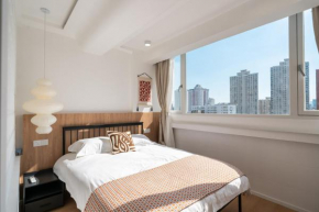 Shanghai Yi Du B&B - 150m walk from Exit 5 of Jiashan Road Metro Station